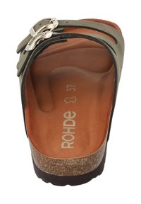 Green leather sandal with two silver buckle accents, cork footbed, and brown textured sole. Size 37 marked on the footbed interior.