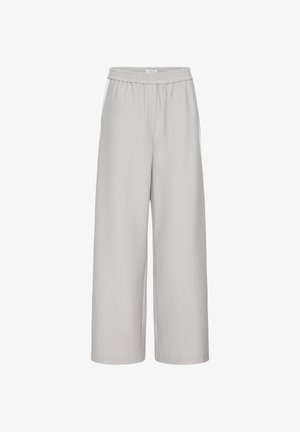 Pantaloni grigio chiaro a gamba larga con girovita elastico, tasche laterali e vestibilità rilassata, mostrati su uno sfondo neutro.