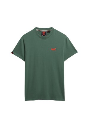 Green cotton t-shirt with a round neck and short sleeves. Features a small red logo on the chest and a contrasting label on the sleeve.