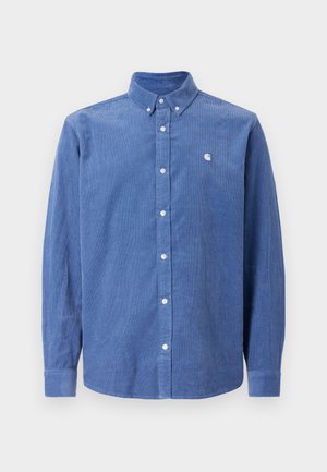 Button-down-Hemd aus leicht blauem Cordstoff, mit einem Button-Down-Kragen und einem runden Logo auf der linken Brust, langen Ärmeln und Manschetten.