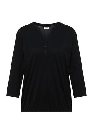 Chemise noire à manches longues avec col en V à trois boutons et ourlet élastique, design simple, étiquette "CECIL" à l'intérieur du col.