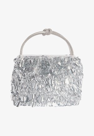 Piccola borsa argento coperta di paillettes luccicanti con una breve maniglia annodata.