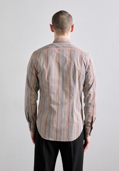 Striped dress shirt with elongated back hem, featuring vertical lines in pastel colors on a light background. Long sleeves with button cuffs.