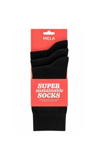 Schwarze Socken verpackt in einem leuchtend roten Kartonhalter, beschriftet mit "SUPER nachhaltige SOCKEN." Hergestellt aus Fairtrade-Baumwolle, Polyamid und polyesterfrei.