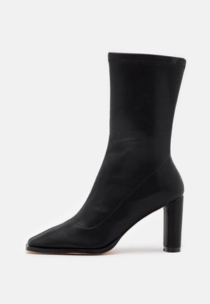 Stivali alti - black