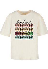 Cream-colored cotton t-shirt featuring a multi-colored graphic that reads "One Loved mama" in varying fonts and patterns, including animal print.