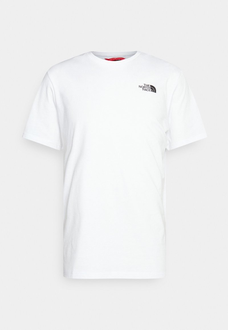 Camiseta de algodón blanca con mangas cortas, cuello redondo y pequeño logo negro en el área del pecho izquierdo. Textura suave, diseño casual.