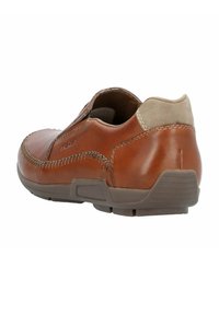 Bruine leren schoen met een glad oppervlak en tan suède accenten. Beschikt over een gepolsterde rand, stikseldetails en een rubberen zool.