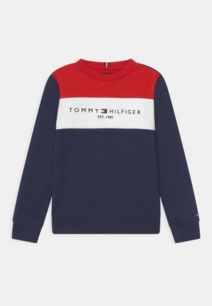 Mørkeblå sweatshirt med røde og hvide vandrette striber. Har "TOMMY HILFIGER EST. 1985" logoet på forsiden. Lavet af blødt materiale.