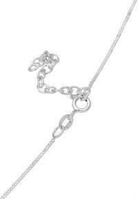 Silver chain necklace featuring varying link sizes with a textured finish and a lobster clasp. Marked "925" for sterling silver.