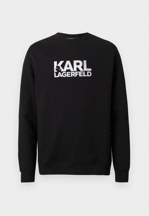 Čierna bavlnená mikina s dlhými rukávmi. Na prednej strane veľké biele potlačené logo "KARL LAGERFELD". Klasický dizajn s okrúhlym výstrihom.