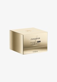 Caja cuadrada dorada con acabado brillante. Logo central "Lancaster" y nombre del producto "Golden Lift Night" impresos en negro. Contiene 50 ml.