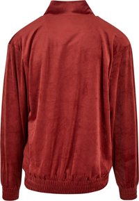 Rød, blød tekstureret zip-jakke med ståkrave, elastisk talje og lange ærmer. Glat udseende, velegnet til afslappet brug.