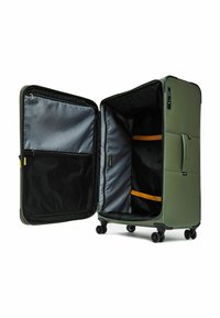 Valigia rigida verde con scomparto con zip, tasca in rete e cinghie arancioni all'interno. Quattro ruote per una facile mobilità. Design resistente.
