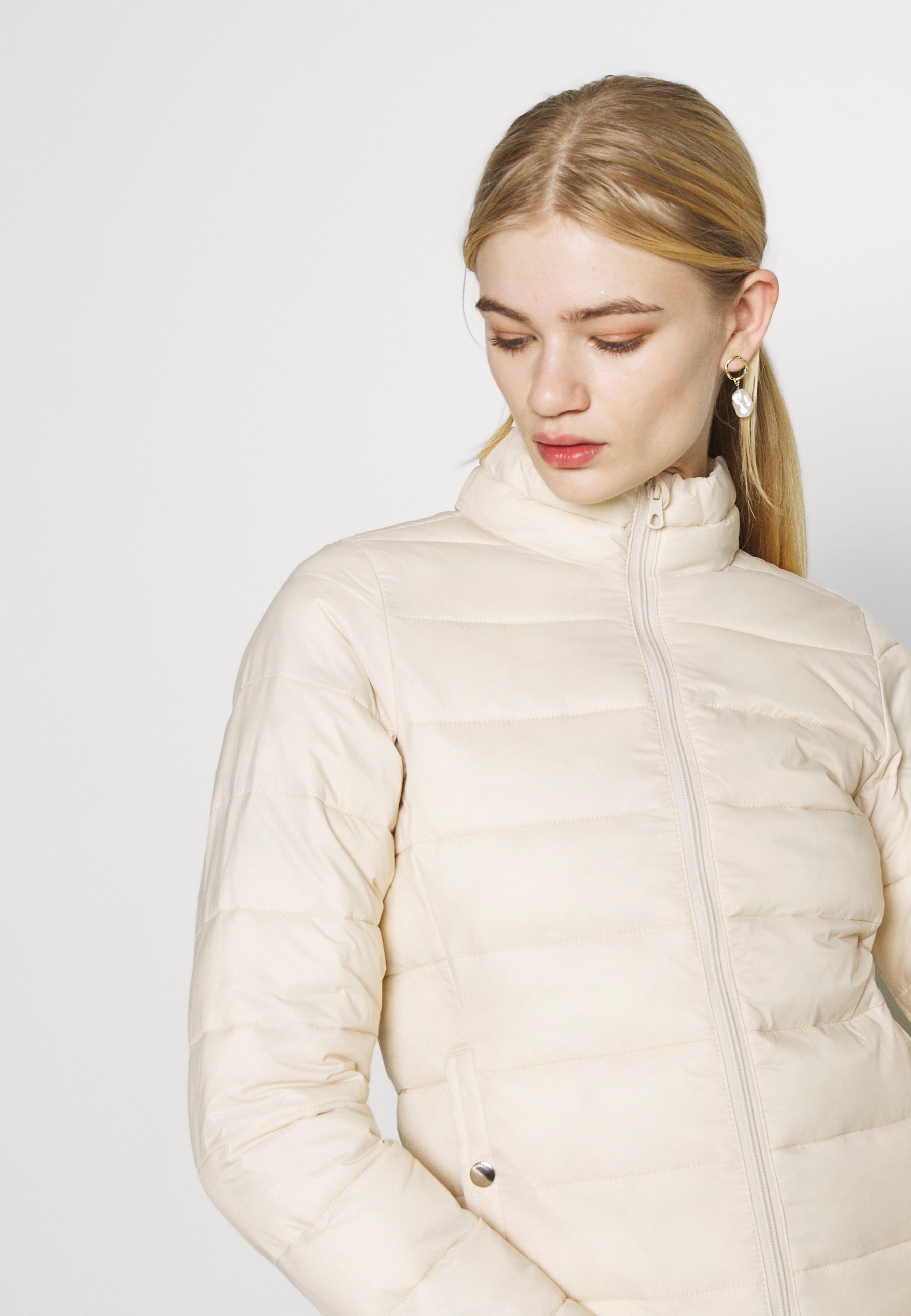 off white quilted jacket