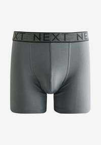 Grijze boxershorts met een zwarte elastische tailleband met een herhalend logopatroon. Gemaakt van zachte stof, met een aansluitend ontwerp en naadloze zijkanten.