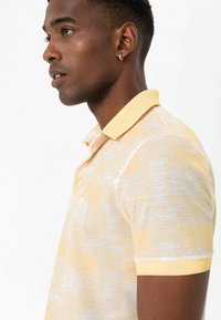 Felix Hardy Poloshirts - yellow
