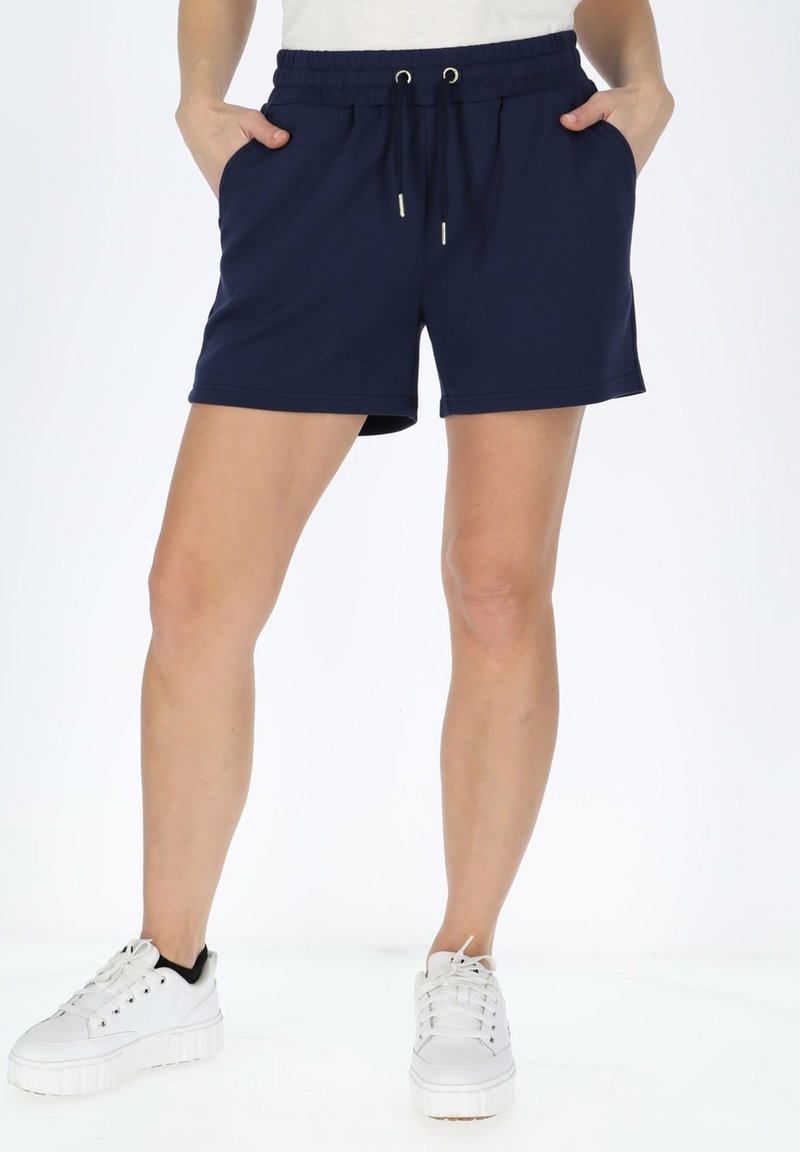 Marineblauwe katoenen shorts met een elastische tailleband, koord en zijzakken, met een ontspannen pasvorm en eenvoudige stikdetails.