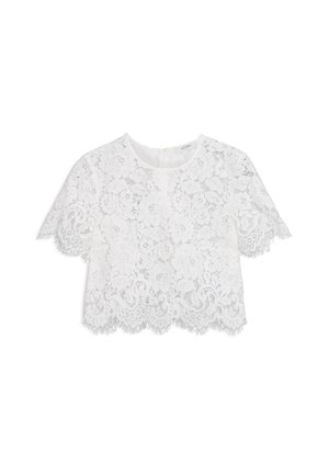 Witte kanten crop top met korte mouwen, bloemenpatroon, geschulpte zoom en een subtiele textuur. Voorzien van een rits aan de achterkant.
