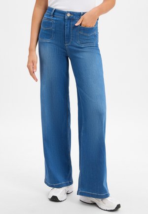 - Jeansy Relaxed Fit