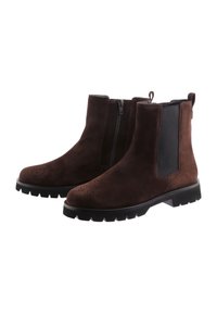 Brown suede ankle boots with a smooth finish, side zipper, elastic panels, and a rugged black rubber sole. Perforated detail on the toe.