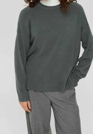 Stickad tröja - teal