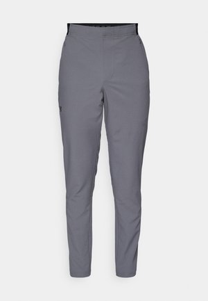 Gray, tapered pants with a smooth texture, elastic waistband, and side pockets. Features a small logo on the left thigh.