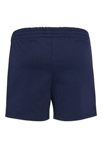 Marineblaue Freizeithose mit elastischem Bund, sichtbare Naht am Saum, von hinten auf weißem Hintergrund gezeigt.