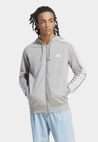 adidas Sportswear - ESSENTIALS FRENCH   STRIPES - Sweater met rits - medium grey heather   white Miniatuurafbeelding 1