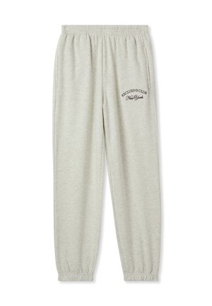 Pantaloni jogger grigi chiari realizzati in morbido misto cotone, con vita elasticizzata, polsini e testo stampato sulla tasca sinistra.