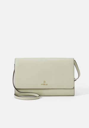 Light green leather crossbody bag with a textured finish, gold logo hardware, and a detachable strap. Compact rectangular shape.