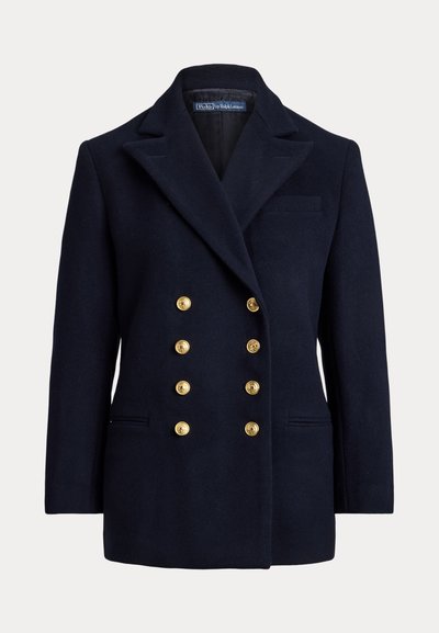 Doppelreihiges navy Blazer aus Wolle mit großen goldenen Knöpfen, spitzen Revers und Seitentaschen. Verfügt über eine Brusttasche und eine taillierte Passform.