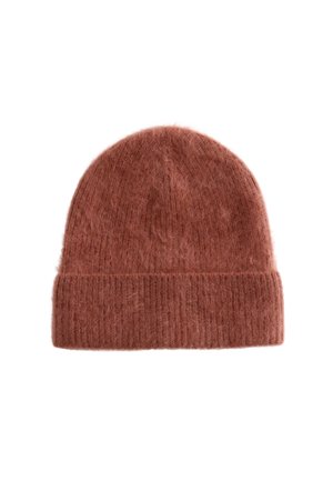Rust-colored knitted beanie made of soft, fuzzy material with a ribbed cuff and rounded top, featuring a textured finish.