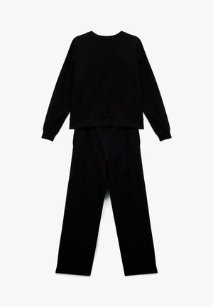 Black sweatshirt and matching pants, made of soft fabric. Crew neckline, long sleeves, and relaxed fit. No visible patterns or accents.