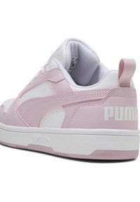 Pink and white leather sneaker with a smooth finish, prominent PUMA logo on the heel, and padded collar for comfort. Features pink accents.