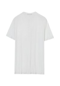 T-shirt bianco a maniche corte realizzato in morbido cotone, caratterizzato da un collo rotondo e una vestibilità rilassata. Dettagli cuciti lungo l'orlo e le maniche.