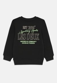 Black sweatshirt featuring embroidery, including "EST 2011," “Sporting Goods,” and “LES DEUX” in mixed font styles. Ribbed cuffs and hem.