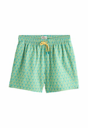 Turquoise swim shorts with repeating yellow palm leaf pattern and yellow drawstring tie at elastic waistband.