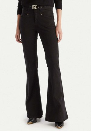 Jeans a zampa - nero