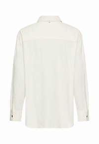 Langsleeve shirt in off-white, met een gestructureerde kraag, knoopmanchetten en een subtiele textuurstof. De achterkant heeft een eenvoudige uitstraling.