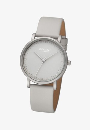 Montre en argent avec un cadran rond et un cadran gris simple. Présente des index horaires et des aiguilles fins. Bracelet en cuir gris doux pour le confort.