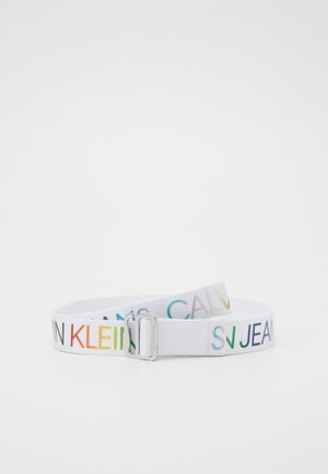 White fabric belt with rainbow-colored "Calvin Klein Jeans" text and a silver rectangular metal buckle on a white background.