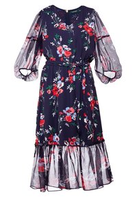 Vestido midi floral en color marino con mangas de globo transparentes, escote en V, cinta en la cintura y dobladillo con volantes, que presenta flores rojas, azules y blancas con hojas verdes.