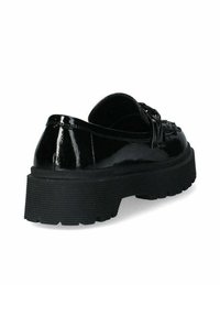 Scarpe in vernice nera con suola in gomma chunky e un motivo testurizzato. Il design include un davanti con lacci di taglio basso.