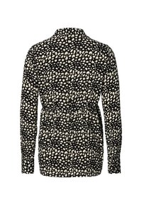 Zwarte longsleeve shirt met een wit gevlekt patroon, een cinch-detail aan de achterkant en een kraag. Gladde stof met een iets relaxte pasvorm.