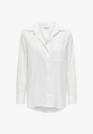 Camicia bianca a maniche lunghe con bottoni, realizzata in lino, con colletto, taschino sul petto e orlo leggermente arrotondato. Presenta un tessuto testurizzato.