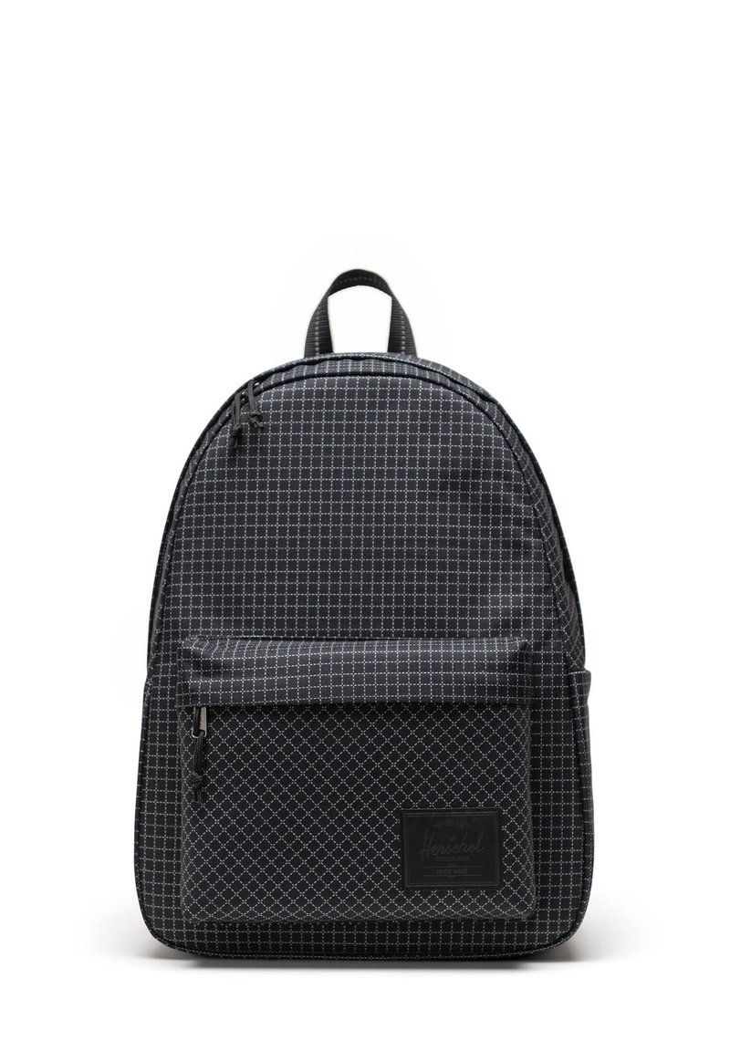 Black backpack with a grid pattern, featuring a front zip pocket and a top handle for carrying. Material has a textured finish.