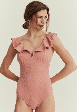 Pink one-piece swimsuit with ruffled sleeves, floral texture, V-neckline, and fitted shape for a sleek silhouette.