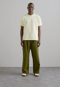 The Kooples MC - Marškinėliai su spaudiniu - bright yellow