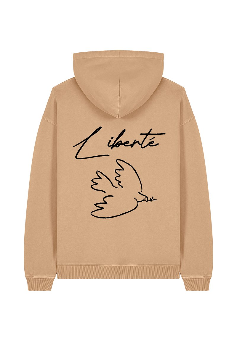 Béžová mikina s kapucí a stahovací šňůrkou, na které je černá grafika holubice držící olivovou ratolest a nad ní slovo "Liberté".